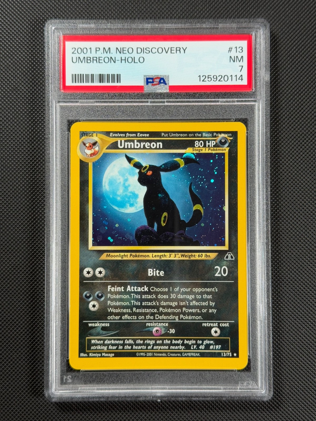 PSA 7 Umbreon 13/75 HOLO Pokémon Card WOTC Neo Discovery Rare Holo NM0