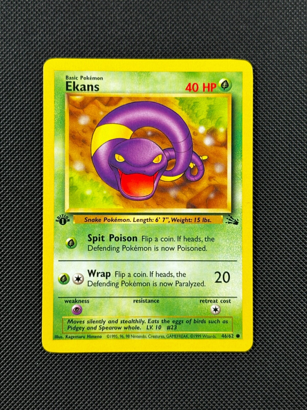 Ekans 46/62 1st Edition Pokémon Card Fossil Common WOTC NM0