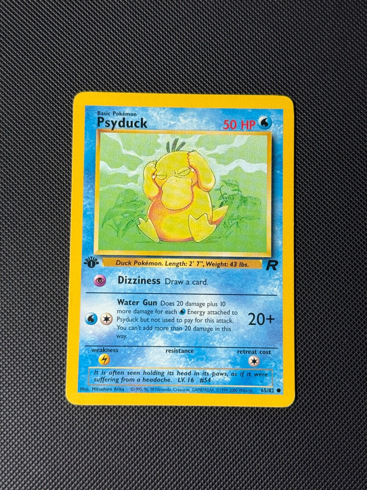 Psyduck 65/82 1st Edition Pokémon Card Team Rocket Common WOTC LP0