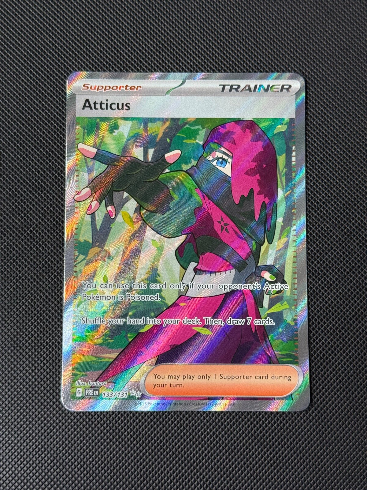 Atticus 133/131 Full Art Trainer Pokémon Card Prismatic Evolutions Holo NM0