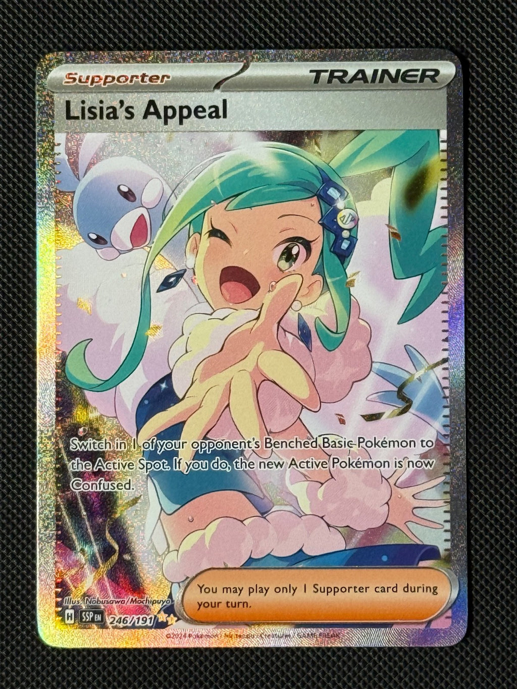 Lisia's Appeal 246/191 Pokémon Card Sv08: Surging Sparks Holo NM0