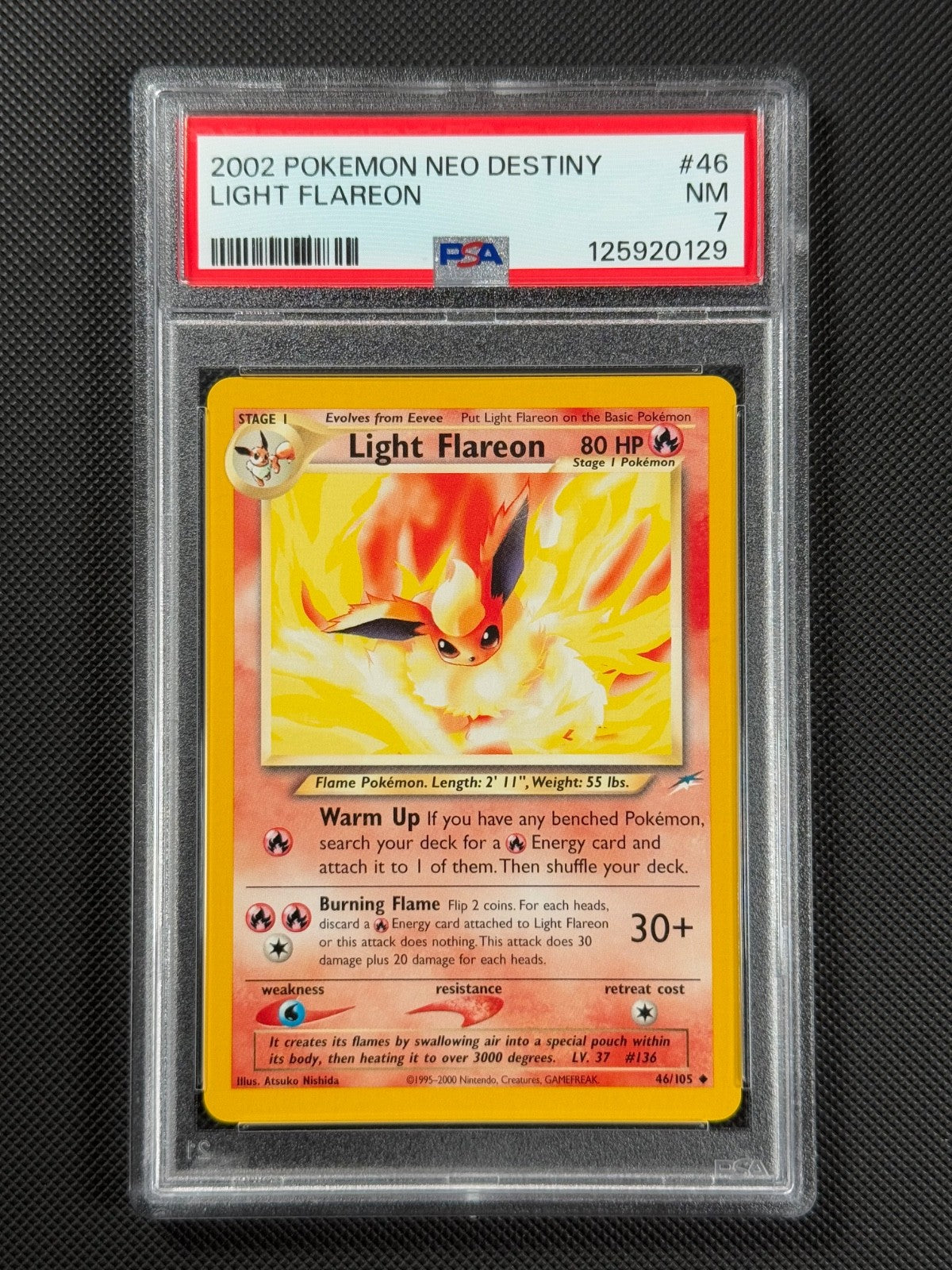 PSA 7 Light Flareon 46/105 REGULAR Pokémon Card WOTC Neo Destiny Uncommon NM0